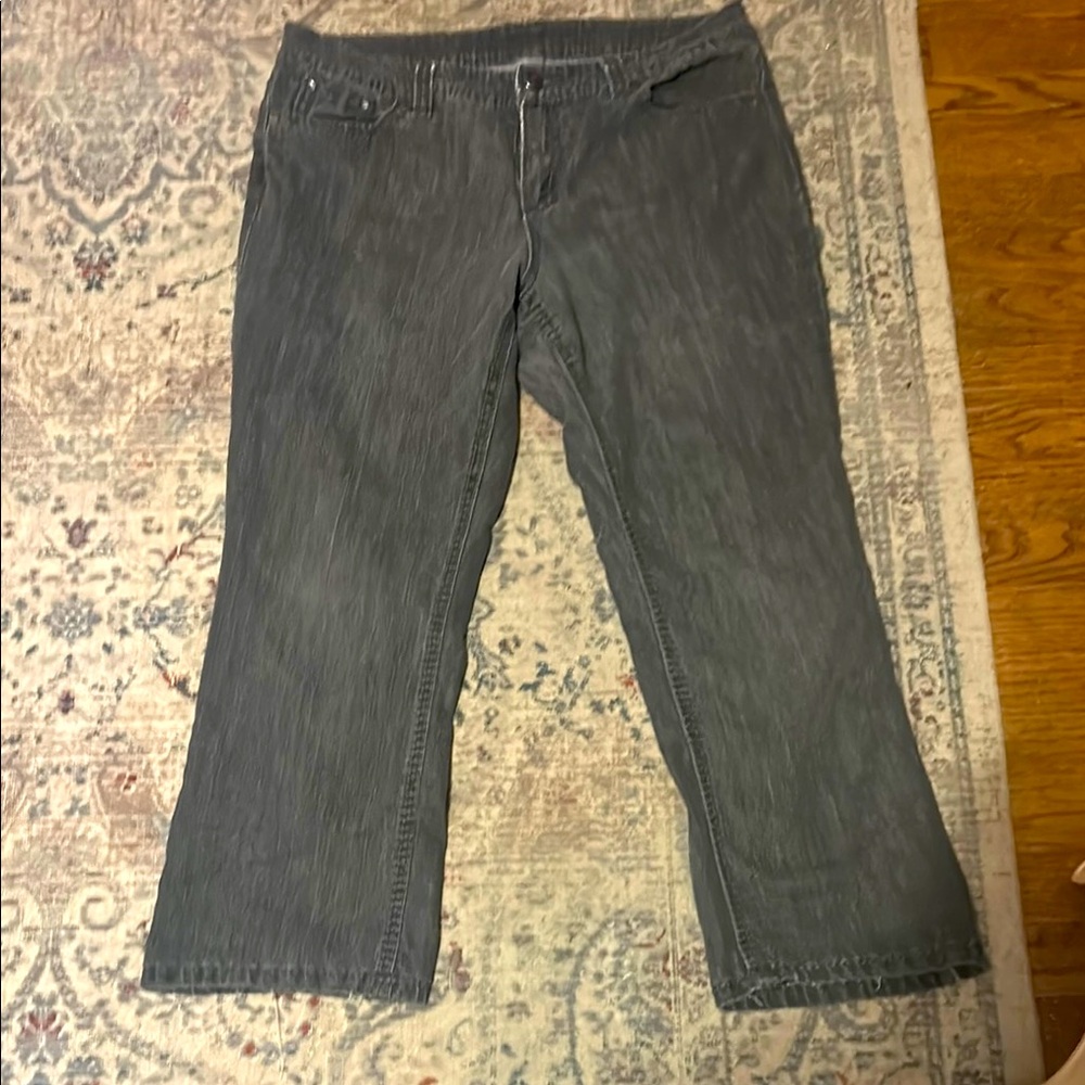 Designer Jeans with Cross on Pockets. Women’s size 14P
Dark Gray Jeans